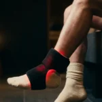 Red light therapy ankle wrap worn while seated in the evening